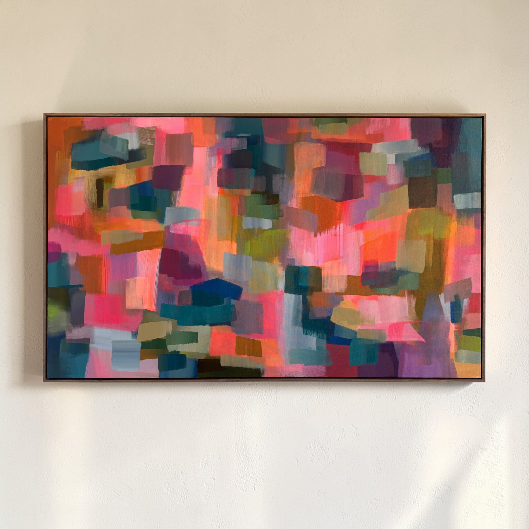 Abstract colorful painting with various rectangular shapes and vibrant colors on a horizontal canvas.
